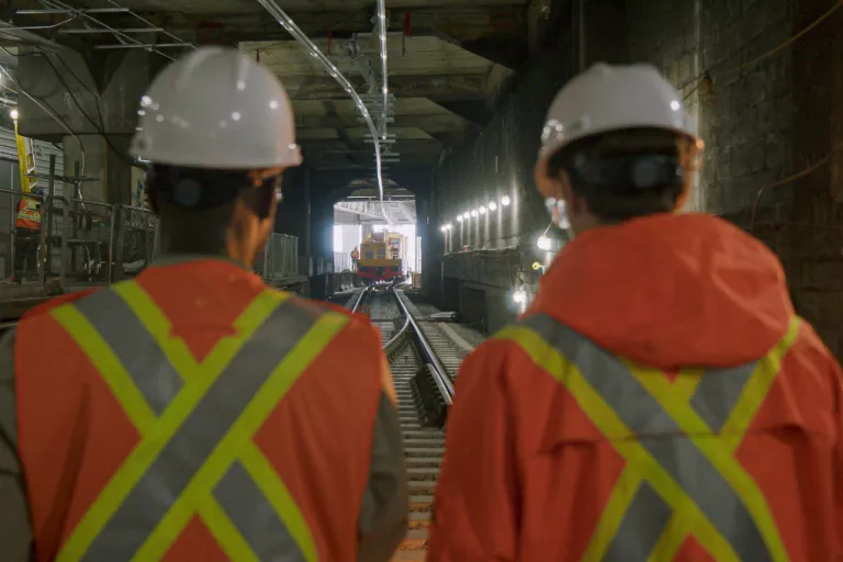 Train technician in a tunnel