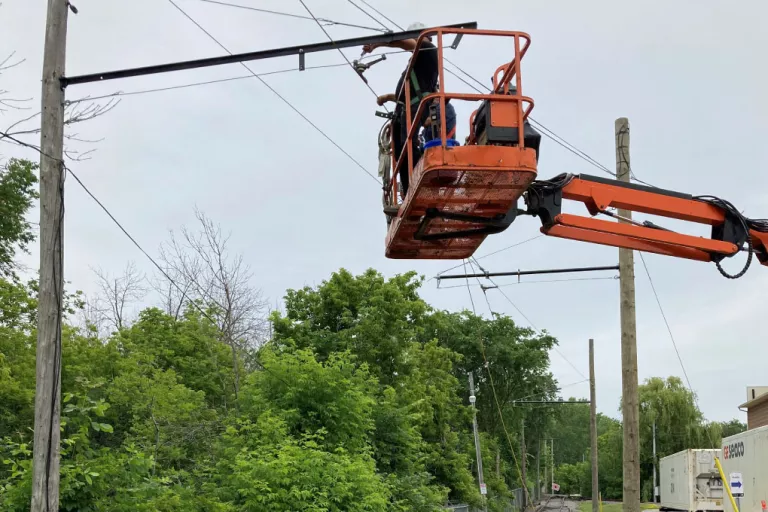 Technician installing Catenary