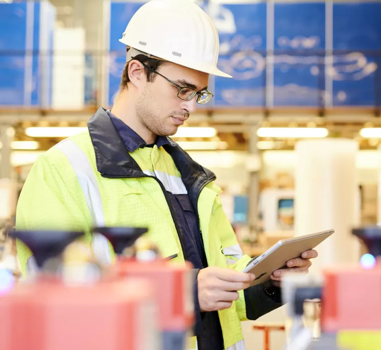 Technician checking consumption of an utility