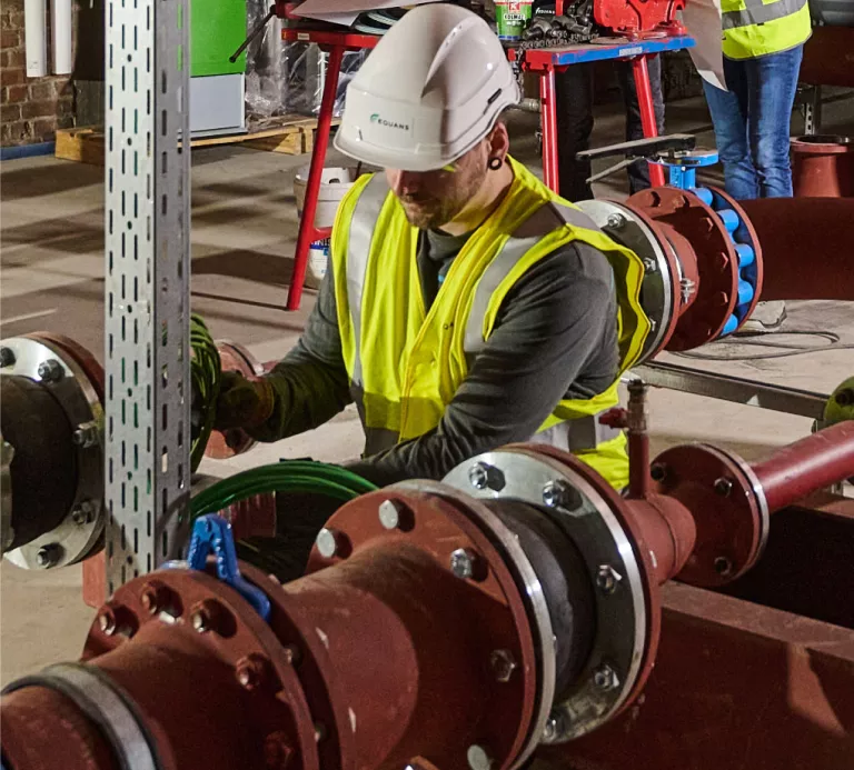 Technician checking consumption of an utility