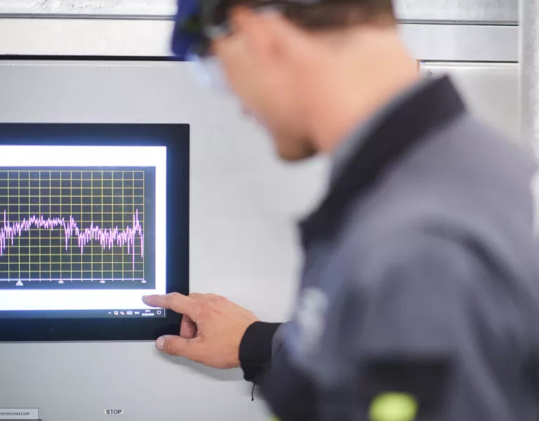 Technician checking consumption of an utility
