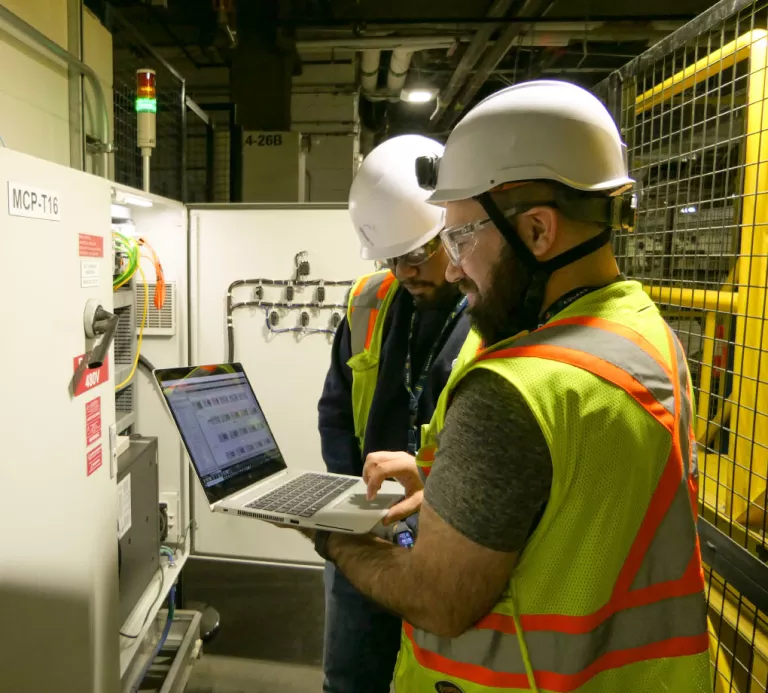 Technician checking consumption of an utility