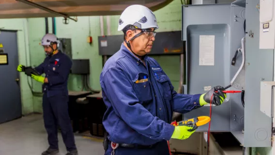 technician working on a system for recommissioning