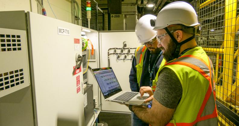 technicians analyzing a Building consumption