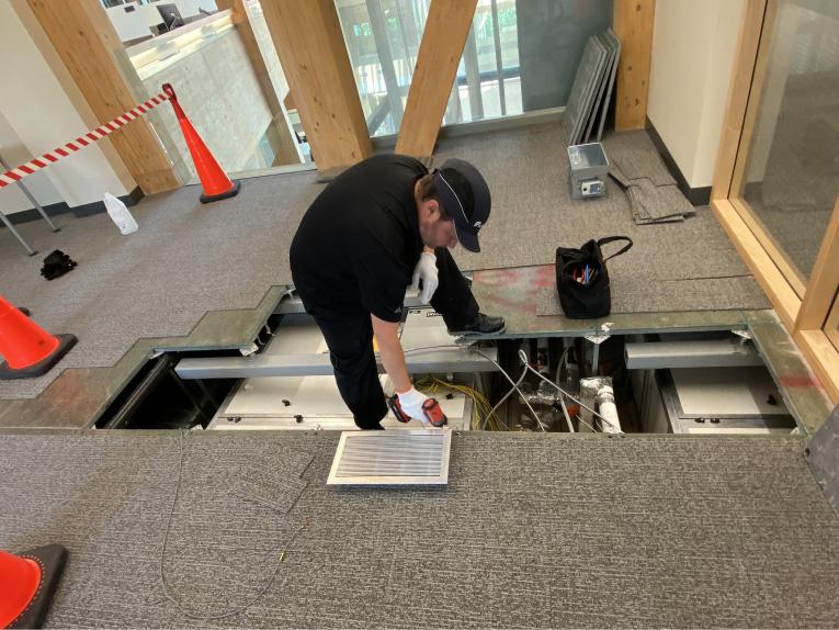 technician working on a geothermal installation