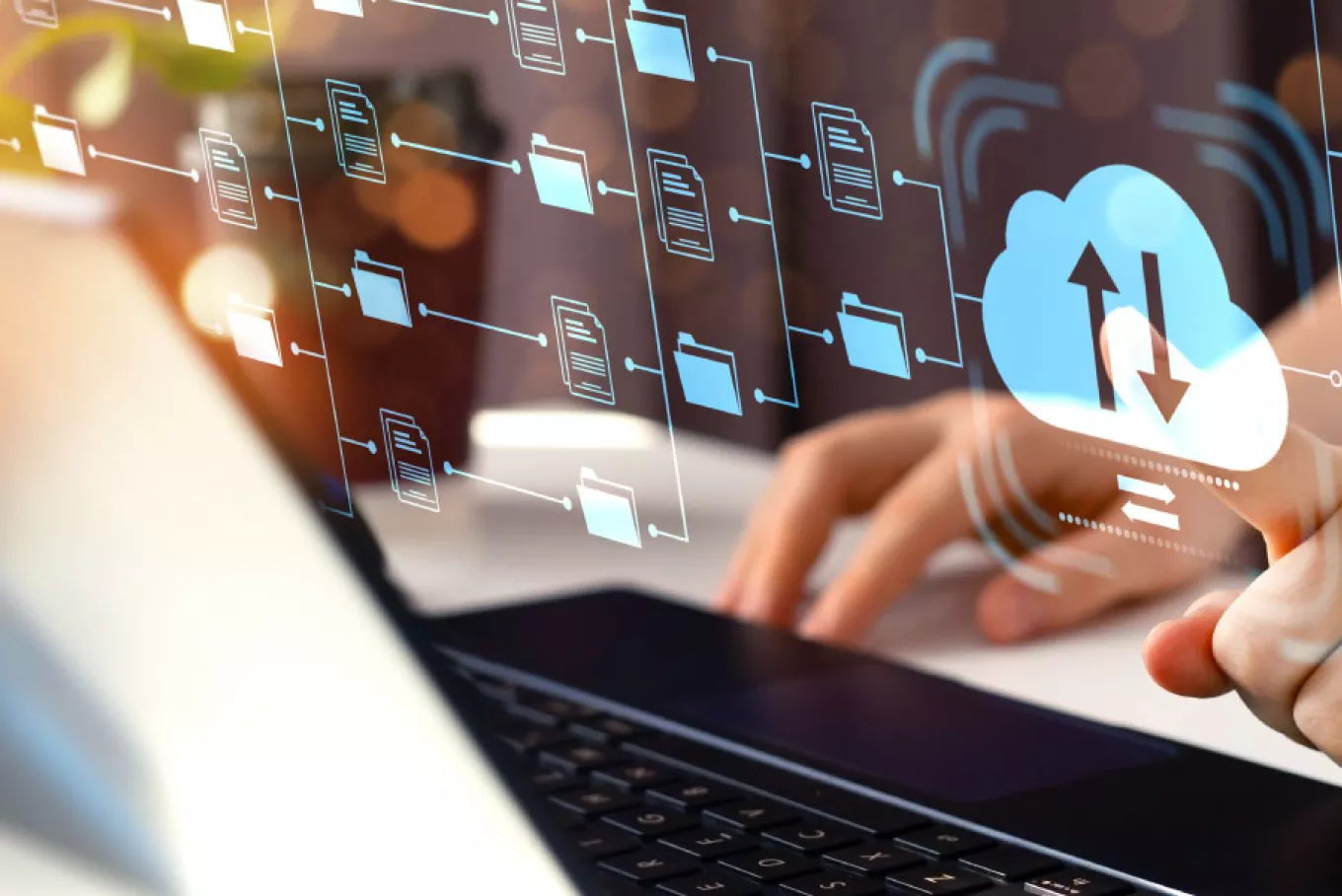 woman working on a computer using cloud solutions 