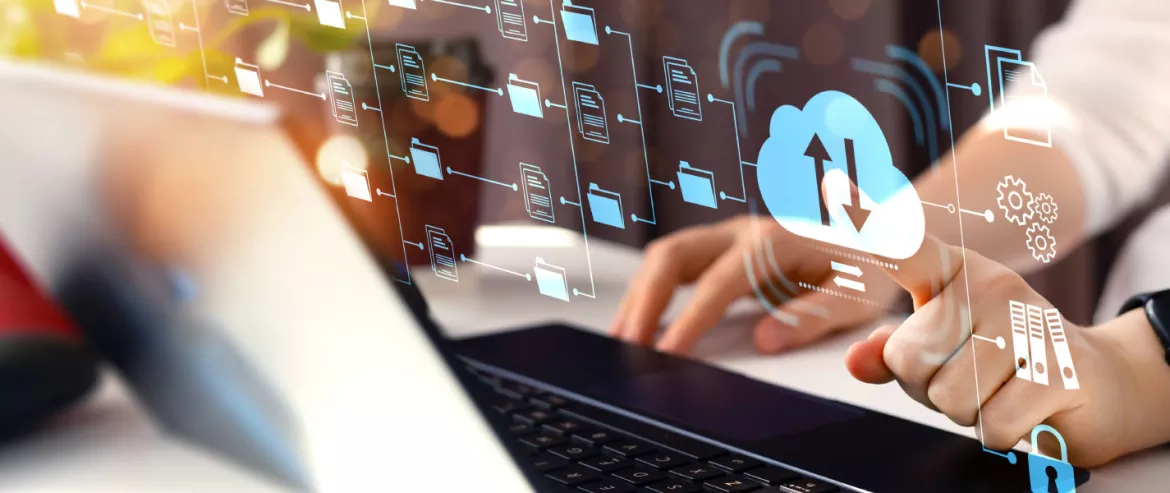 woman working on a computer using cloud solutions 