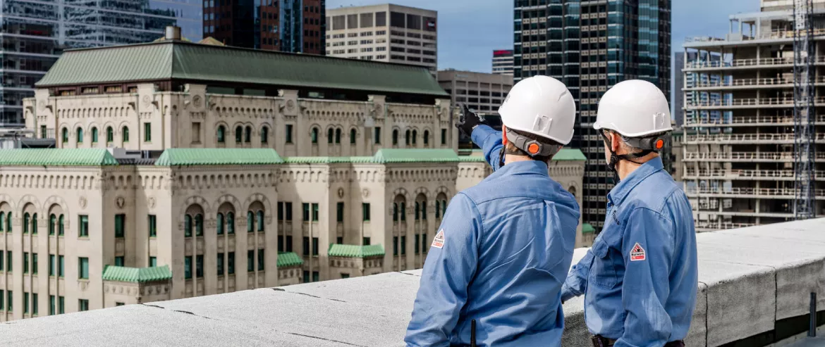 technician working on a roof