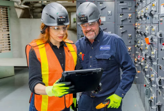 technicians analyzing a Building consumption