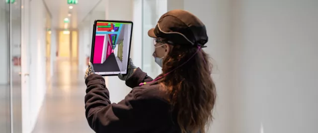 Equans woman employee using Simulation tool for IoT